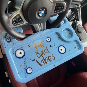 Steering wheel “eating” tray