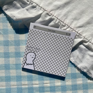 May include: A square sticky note featuring a grey and white checkerboard pattern, a computer window header labelled free pngs, and a cartoon character with the printed text you're a jpeg aren't you? The note has a white border and a simple line drawing.