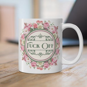 Vintage floral coffee mug that says Fuck Off