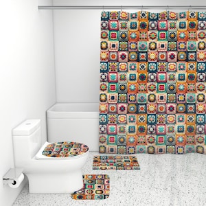 May include: A bathroom set with a crocheted pattern in shades of orange, blue, green, and pink. The set includes a shower curtain, a bath mat, a toilet seat cover, and a smaller rug.