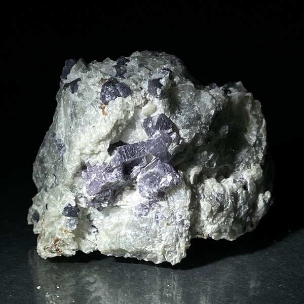 Purple Spinel on Forsterite from Canada