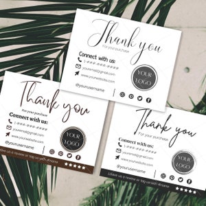 以下が含まれることがあります： 茶色と白のカラーリングのサンキューカードが3枚。各カードには、「ありがとう」という手書きのフォントで書かれたテキストがあります。カードには、「ご購入ありがとうございます」と「お問い合わせ先：」というテキストも記載されており、その後に連絡先情報が続きます。各カードには、「あなたのロゴ」と書かれたロゴのプレースホルダーがあります。