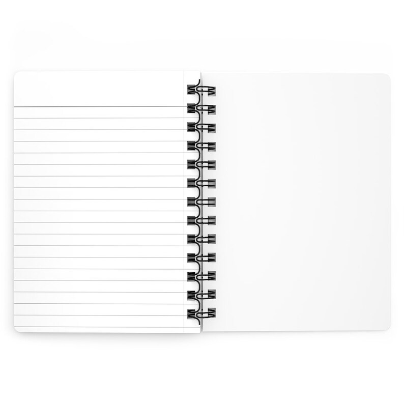 May include: A white spiral bound notebook with lined pages. The notebook is open to a blank page.
