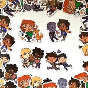 May include: A collection of colorful cartoon character stickers featuring various characters with different expressions and poses. The stickers are printed on white paper and have a glossy finish.