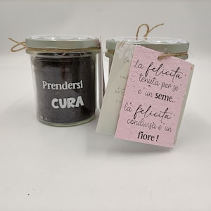 Barattolo "Prendersi cura" con carta che germoglia