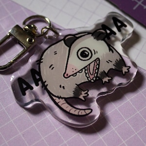 AAA Opossum Acrylic Keychain
