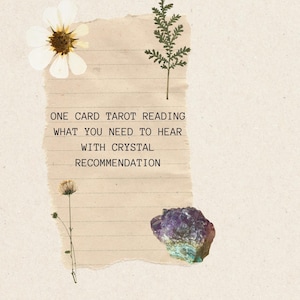May include: A beige background with a torn paper element featuring the text "ONE CARD TAROT READING WHAT YOU NEED TO HEAR WITH CRYSTAL RECOMMENDATION." The image includes pressed flowers and a purple crystal.