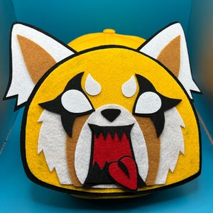 Angy red panda hat