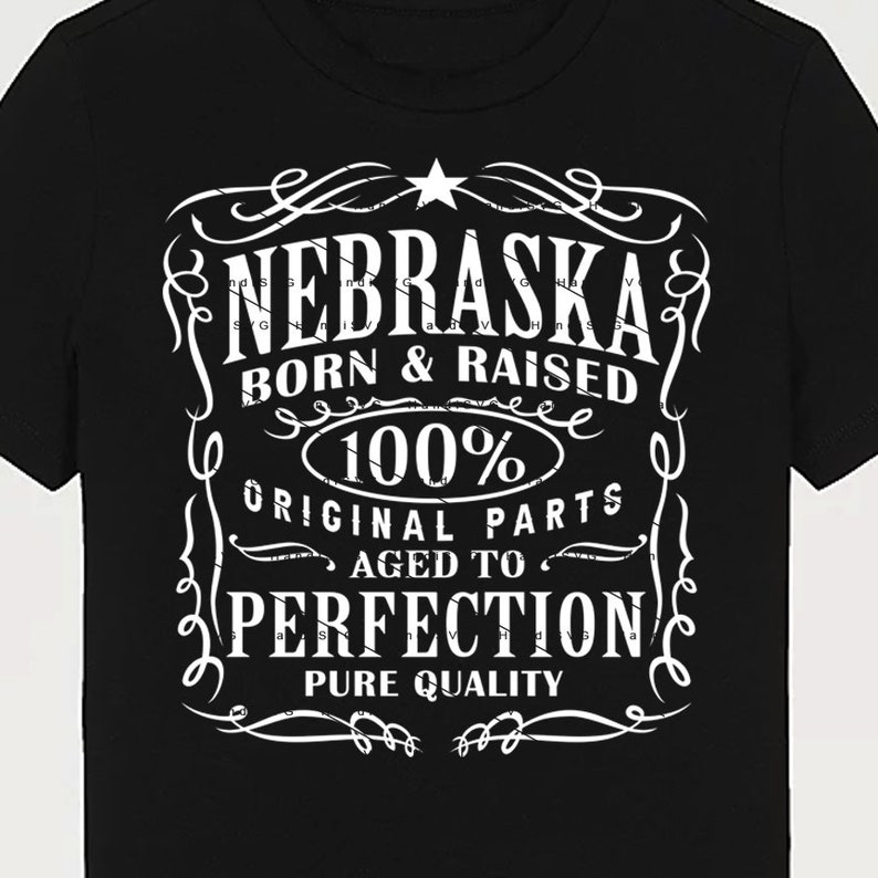 May include: Black t-shirt with a white graphic design that says "Nebraska Born & Raised 100% Original Parts Aged to Perfection Pure Quality".