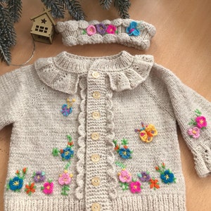 Hand knitted baby girl set :  baby girl  cardigan,   headband- the unique embroidered complement to your little girl's outfits.