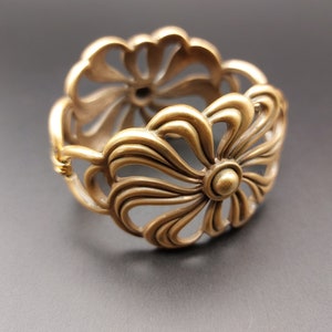 Vintage Monet bracelet, wide art nouveau style floral design, openwork with brushed finish