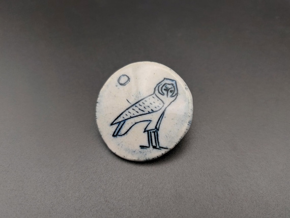 Vintage handmade ceramic owl brooch, round with light grey navy blue glaze, primitive style