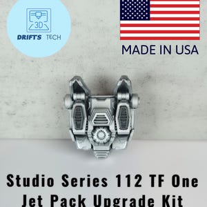 Puede incluir: Un kit de actualización Jet Pack Studio Series 112 TF One plateado. La imagen incluye el texto "Made in USA" y un logotipo que dice "Drifts Tech" con un icono de impresora 3D.