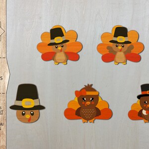 May include: Four digital cut files for laser cutting turkey earrings. The designs include a traditional turkey with a pilgrim hat, a turkey with a bow, a turkey with a pilgrim hat and a turkey with a bow and a pilgrim hat.