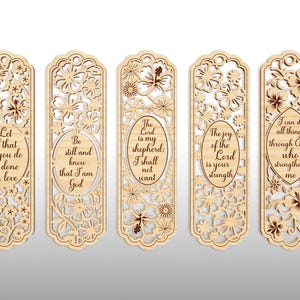 May include: Set of five wooden bookmarks with floral cutouts and inspirational quotes. Each bookmark features a unique design with phrases like "Let all that you do be done in love" and "The Lord is my shepherd."