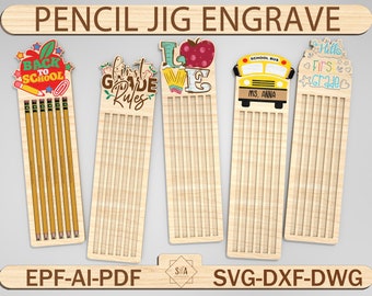 May include: Five wooden pencil holders with different school-themed designs. The designs include "Back to School", "First Grade Rules", "Love", "School Bus", and "Hello First Grade". Each holder has slots for pencils.