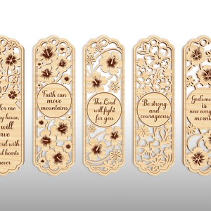 May include: Five wooden bookmarks with intricate floral cutouts and inspirational quotes. The bookmarks feature various designs, including flowers and text such as "Faith can move mountains" and "God's mercy is new every morning."