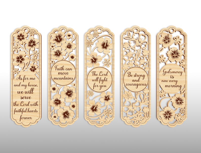 May include: Five wooden bookmarks with intricate floral cutouts and inspirational quotes. The bookmarks feature various designs, including flowers and text such as "Faith can move mountains" and "God's mercy is new every morning."