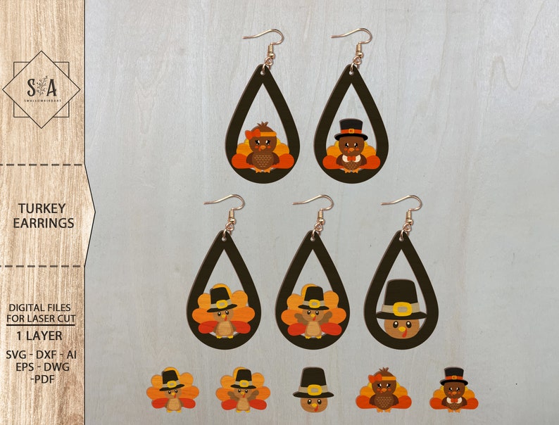 May include: Six laser cut wooden earrings featuring a Thanksgiving turkey design. The earrings are shaped like teardrops and have a brown background with a cartoon turkey wearing a pilgrim hat and a red, orange, and yellow feather design.