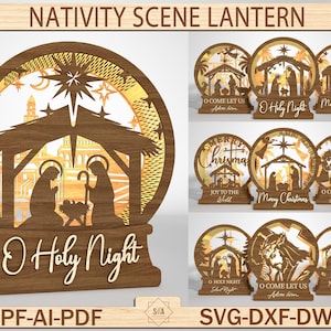 Może przedstawiać: Drewniana latarnia z szopką z napisem "O Holy Night". Latarnia przedstawia sylwetkę sceny Bożego Narodzenia w okrągłej ramie. Pokazano również inne latarnie z bożonarodzeniowymi przesłaniami.