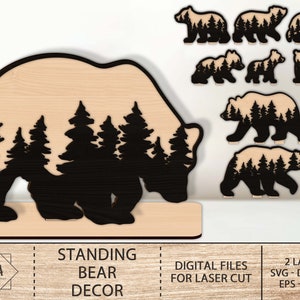 May include: Laser cut design of a standing bear with a forest scene inside. The design is made of two layers and includes a separate set of smaller bears with forest scenes. The design is labeled "Standing Bear Decor" and "Digital Files for Laser Cut".