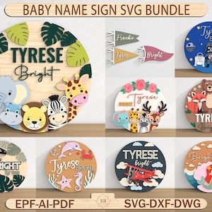 Pode incluir: Uma coleção de placas de nomes de bebês com vários designs. As placas são redondas e apresentam nomes como "Tyrese" e "Frankie", juntamente com elementos decorativos como animais, uma sereia e um dinossauro. As placas são feitas de madeira e têm detalhes coloridos.