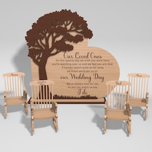 May include: A wooden wedding memorial featuring a tree design and the text "Our Loved Ones." Four miniature rocking chairs are placed in front of the memorial, each labeled with a family member's name. The memorial includes the text "Our Wedding Day."