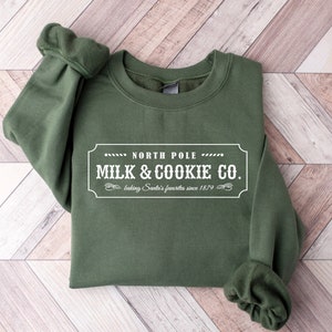 Milk and Cookie Co Sweatshirt, Christmas Sweater, Christmas Crewneck, North Pole Shirt, Winter Sweater, Holiday Gifts, Merry Xmas Shirt image 1