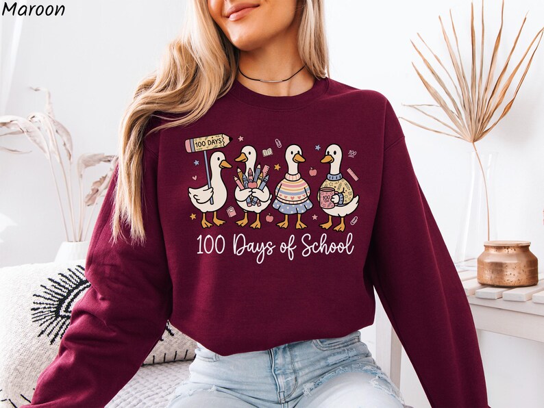 May include: A white ceramic mug with a black handle and the text "But First, Coffee" in a bold, black font. The mug is set against a blurred background, suggesting a cozy setting. The mug appears to be approximately 4 inches tall.