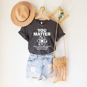 May include: A rustic wooden sign with the text "Welcome to our home" in white lettering. The sign features a distressed finish and a simple, inviting design, perfect for a front porch or entryway.