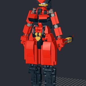 Op de afbeelding: Een rood en zwart Lego-figuur met een duivelachtig ontwerp. Het figuur heeft een rode torso, armen en benen, met zwarte accenten. Het heeft een hartvormig detail en een geel en goudkleurig wapen. Het figuur heeft een zwarte kop met witte hoorns.
