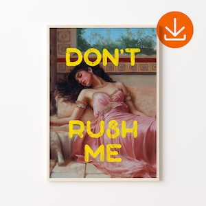 May include: A woman in a pink dress lies on a couch with the words "DON'T RUSH ME" written in yellow paint.