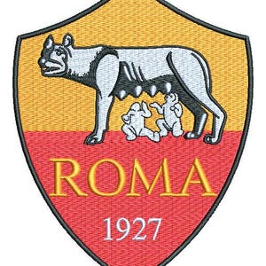 May include: A red and yellow shield with a wolf and two babies inside. The shield has the word "ROMA" and the year "1927" on it.