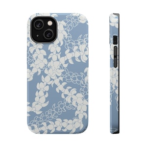 May include: A light blue smartphone case featuring a repeating white floral lei pattern. The design covers the back and side of the case, which includes cutouts for the camera lens and side buttons. The pattern consists of interconnected flower shapes.