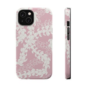 May include: A phone case featuring a dusty rose pink background with a repeating white floral lei pattern. The design covers the back and side profile, showing the camera cutout, volume buttons, and power button on the side of the protective cover.
