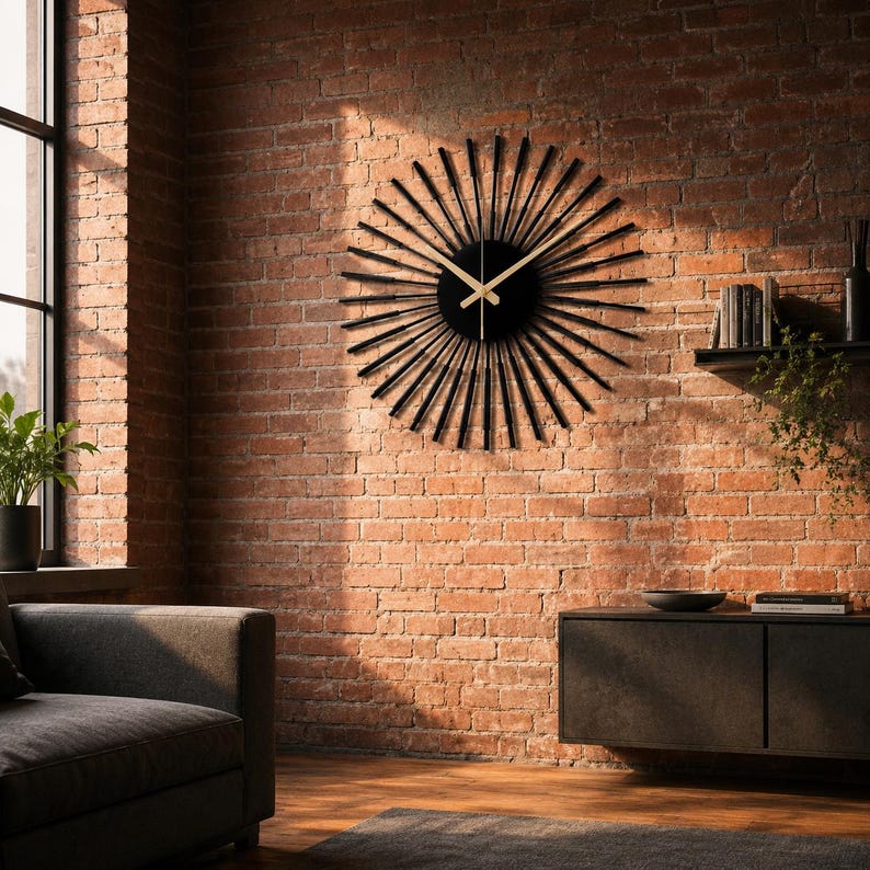 May include: A black and gold sunburst wall clock with a round face and radiating lines. The clock is mounted on a red brick wall, adding a decorative element to the room. The clock's hands are gold.