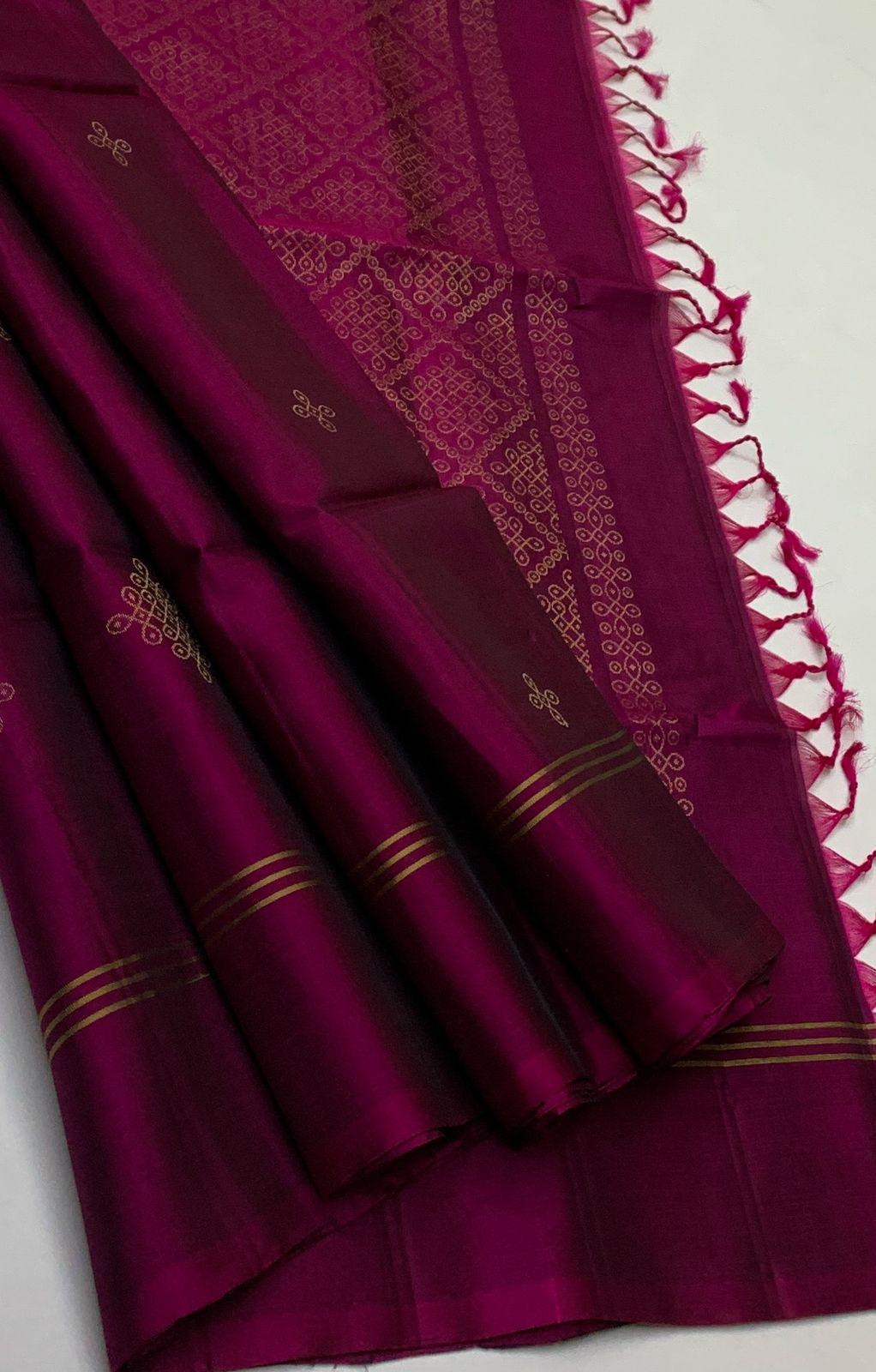 Borderless navy blue sparkling glitter russel net saree with self-pallu, and a contrast floral printed and zig-zag patterned blouse