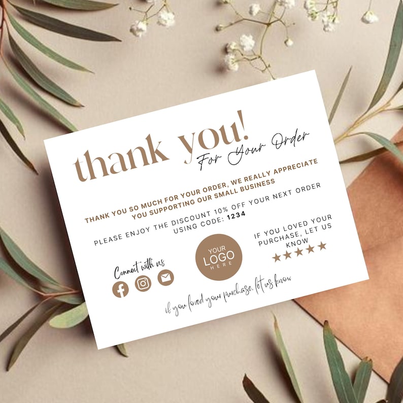 May include: A white thank you card with brown text. The card says "Thank you! For your order." and includes a discount code for 10% off the next order. The card also includes social media icons for Facebook, Instagram, and email.