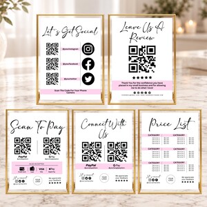 May include: Five vertical rectangular signs in gold frames featuring white backgrounds with black text and QR codes. The signs include headings like Let's Get Social, Leave Us A Review, Scan To Pay, Connect With Us, and Price List with pink accents.