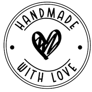 May include: Black and white circular stamp with the text "HANDMADE WITH LOVE" and a hand-drawn heart in the center.