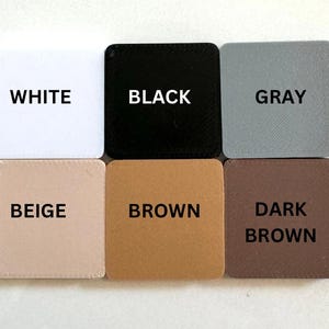 May include: Six colour swatches, each with a different colour name: white, black, grey, beige, brown, and dark brown.