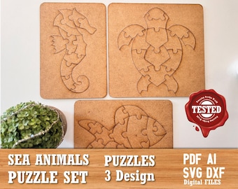 May include: Three wooden puzzle pieces featuring a seahorse, a turtle, and a fish. The puzzles are made of wood and have a light brown color. The puzzles are labeled "Sea Animals Puzzle Set 3 Design" and "PDF AI SVG DXF Digital Files".
