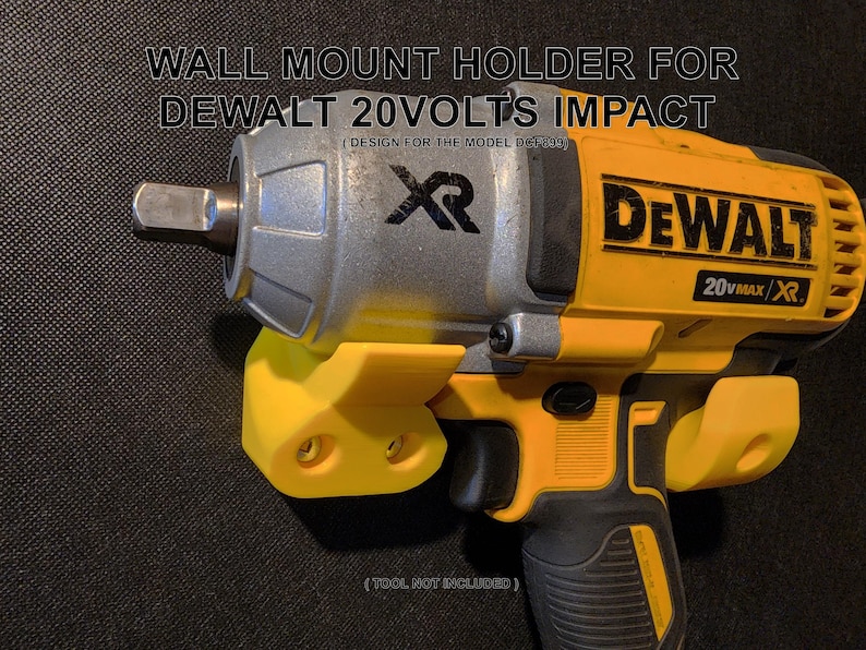 May include: A yellow and black DeWalt 20V Max XR impact driver mounted on a yellow wall mount holder. The holder has two screw holes for mounting.