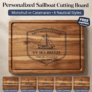 May include: A wooden cutting board with a carved sailboat design. The board features the text "THE CAPTAIN'S GALLEY" and "S/V SEA BREEZE PORT OF ANNAPOLIS EST. 2004". The board is rectangular with a recessed edge and includes the text "Monohull or Catamaran • 6 Nautical Styles".