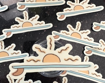May include: A set of nine stickers featuring a cartoon sun setting over a surfboard. The stickers are beige, light blue, and orange.