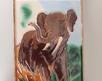 A cloisonne tile from Westraven of an elephant