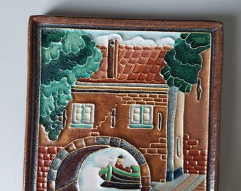 Cloisonne tile Porceleyne of the water gate of the Oostpoort in Delft