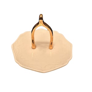 Anillo/soporte de joyas con forma de hueso de la suerte de IMM