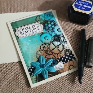 Carte Steampunk engrenage pour un anniversaire ou une occasion particulière accompagnée de son enveloppe assortie