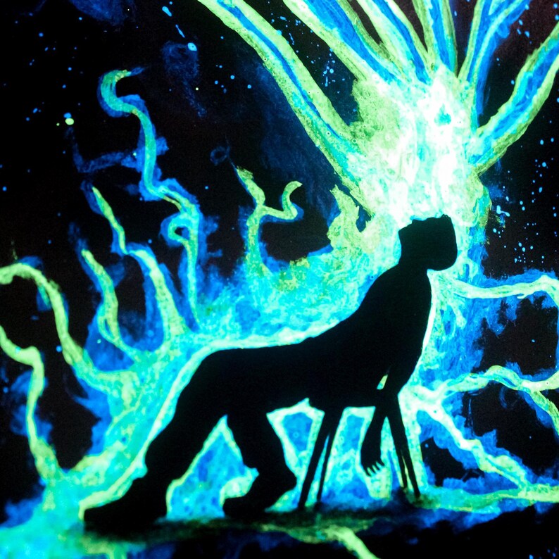 Glow in the dark painting of a man with cosmic energy bursting from his head, psychedelic galaxy wall art